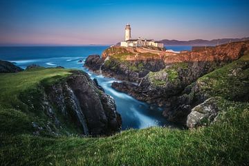 Fanad Head lighthouse in Ireland in the last evening light by Jean Claude Castor