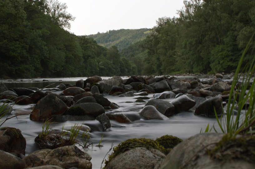 Fast flowing river by Michel Koenes