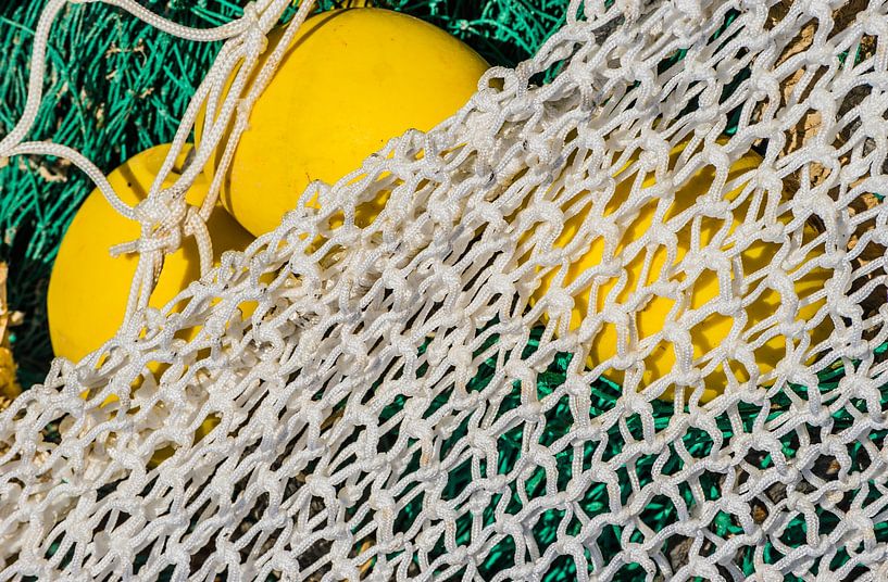 Close-up of maritime fisher net and buoy by Alex Winter