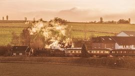 Stoomtrein bij de Eyserhalte tijdens de kersttijd van John Kreukniet