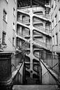 Trappenhuis in een traboule in oud-Lyon, zwartwit, fotoprint van Manja Herrebrugh - Outdoor by Manja thumbnail