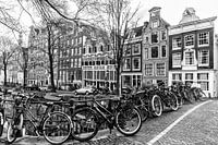A few bikes on a bridge of the Bloemgracht in Amsterdam.