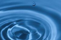 Textuur, achtergrond gemaakt met dompelende waterdruppel