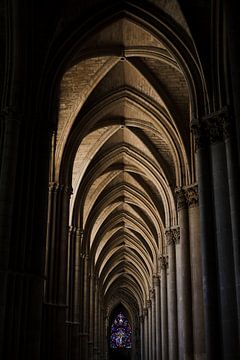 Stained glass as end point in cathedral by Milou Emmerik