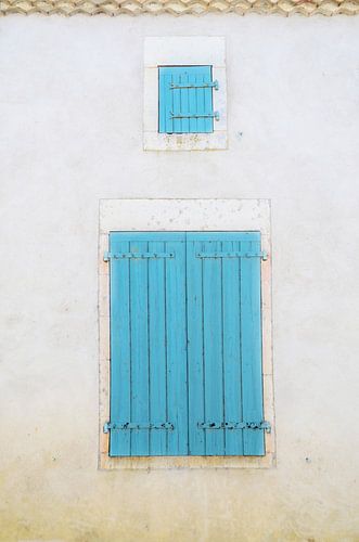 Blue shutters of a house in France