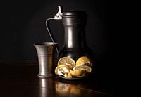 Still life with historical Tin and lemon