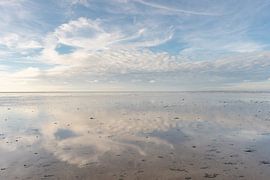 Cloudy sky reflection on the Wadden Sea by Margreet Riedstra