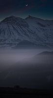 Monduntergang in den französischen Alpen