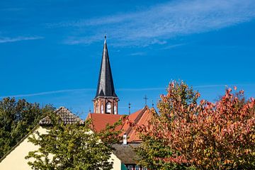 Church with blue sky in Wustrow, Germany van Rico Ködder