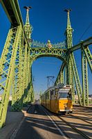 Tram 47 passes over the Freedom Bridge in Budapest