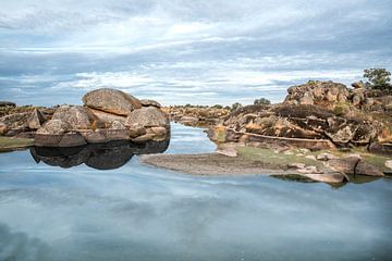 Rock Formation to Silent Water Reflection of Time and Nature