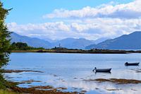 Beautiful lake in Scotland against a backdrop of mountain range