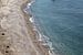 Rots van Aphrodite op Cyprus met kuststrook en zee van Eric van Nieuwland
