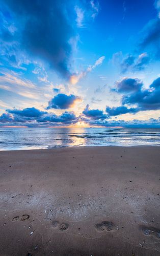 Voetstappen op het Strand