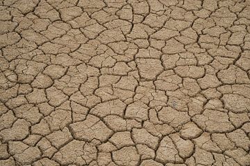Very dry, cracked soil by Gert van Santen