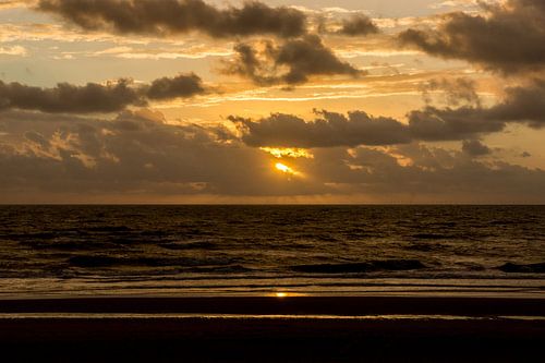 Zonsondergang op zee