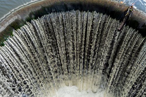 View from a bridge into a weir