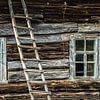 Verlaten houten huis in Belarus van Hilda Weges
