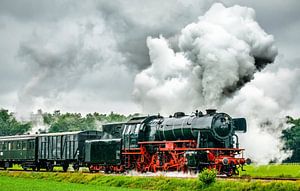 Steam train with smoke from the locomotive