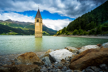 Church tower at the Reschensee, Italy