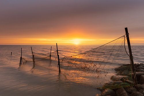Fishing poles at Roptazijl: Wavy Water and Colourful Sky