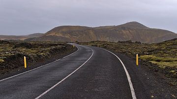 Winding road through Svartsengi in Iceland by Timon Schneider