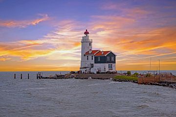 Lighthouse 'The Horse of Marken' near Marken on the IJsselmeer at sunset by Eye on You