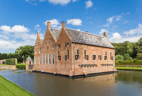Historic Menkemaborg in the canal in Uithuizen, Groningen
