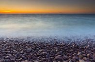 Pebble beach at sunset by Marcel Kerkhof thumbnail