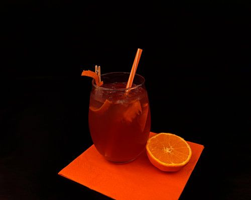 Gin met cranberrysap en sinaasappelsap