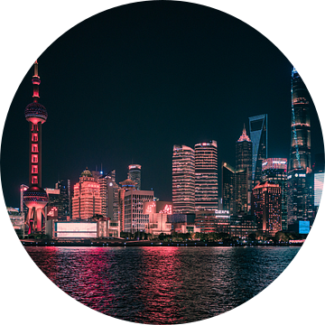 Gloeiende skyline: Shanghai bij nacht