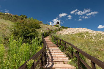 Uplifting Pathway to Hilltop Chapel for Panoramic Living Room Decor