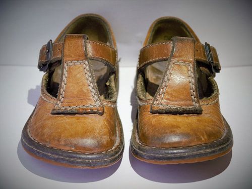 a pair of old children's shoes