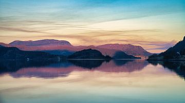 Western Cape in Norway. Fjord and sea with sunset and mountains on the coast by Martin Köbsch