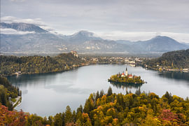 Autumn at Lake Bled – the island church against the backdrop of the Julian Alps by Rolf Schnepp
