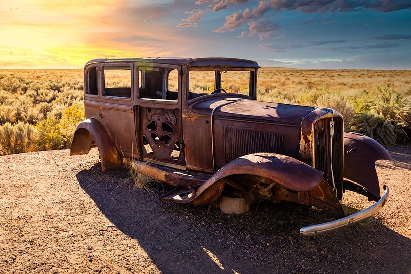 Châssis rouillé d'une voiture ancienne dans le parc national de Petrified forest en Arizona USA au c par Dieter Walther