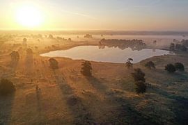 Luftaufnahme eines Sonnenaufgangs auf der Veluwe von Eye on You