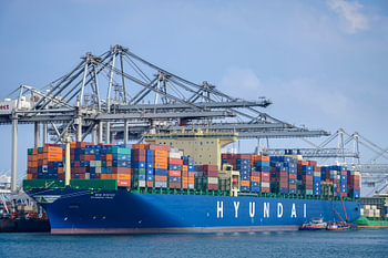 Container ship in the port of Rotterdam at the container terminal