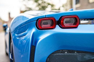 Ferrari SF90 sports car rear light in light blue by Sjoerd van der Wal Photography