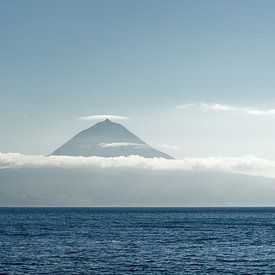 A view of the Azores in the Atlantic, looking from São Jorge towards the Pico volcano with a lenticular cloud by Ralf Lehmann