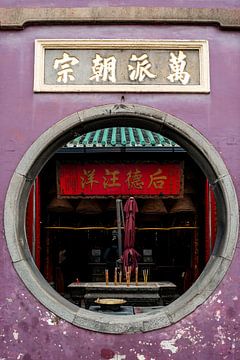 Rond raam bij een tempel in Macau