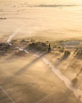 Morning mist over Burgwerd - Frisian village in Golden Silence by Ewold Kooistra