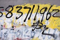grafitti with numbers on concrete wall by Tony Vingerhoets thumbnail