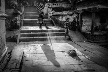 Busy woman in Kathmandu Nepal by Wout Kok