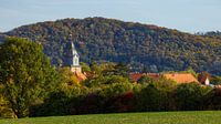 The church tower of Herleshausen in autumn
