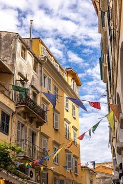 Colourful flags above the streets