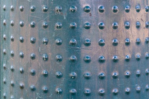 Metal with studs blue green.