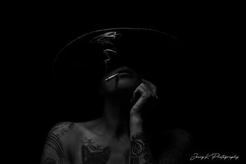 The Smoking Lady in the Shadow