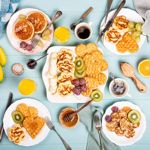 Healthy breakfast, pancakes and waffles by Iryna Melnyk