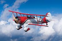 Classic red and white Double Decker Airplane in a bird's eye view